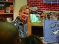 Carson (Fab Five) reads his book
