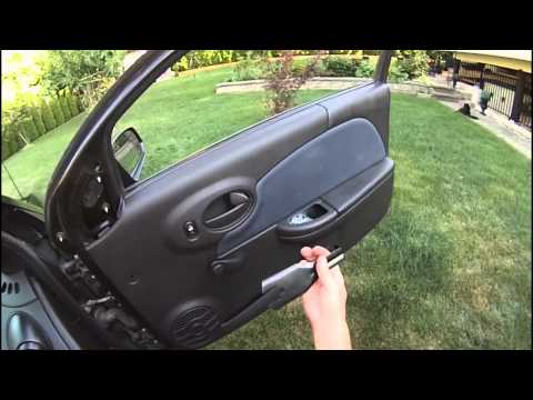 how to remove saturn sl door panel