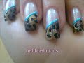 These are the cute and sexy nails that have been inspired by flinstones. I used: The base coat: KILLY'S Durcisseur Actif pour Ongles Thin lined nail polishes: Vollare (all 3 of them) Brown shimmery Nail polish Bluish-turqoise color rhinestones and a topcoat PLEASE LET ME KNOW IF I MISSED ANYTHING OR DIDN'T MAKE MYSELF CLEAR ENOUGH. THANK YOU.