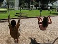 Andrew & Britney on the swings at Father Mac\