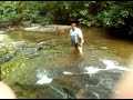 Big man slides down Helton Falls, N. GA