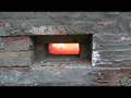 40 Foot Flame In Wood Fired Kiln Seen Through Chimney Port