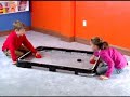 face-off frenzy powerband hockey is perfect for those without the money or room for an air hockey table. the powerbands create riccochet action without the annoying 