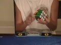 Kid solves Rubik's Cube in under 35 seconds!