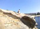 matt, edan, anton tackle 40 foot low tide camp cove. tom rabin behind the lense documenting the stupid skit.
