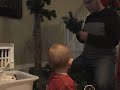 Ben and Daddy start putting up the Christmas Tree