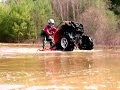 06 Polaris Sportsman 500 EFI doing a little water wheelie