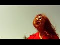 She sings "Somewhere over the rainbow" backwards... and the video is played backwards