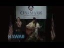 willie k. performs his song mountain of gold at the obama ohana  rally in support of barack obama in lihu'e, kaua'i, hawai'i.  obama's sister, maya soetoro-ng spoke at the rally.   sign waving by kaua'i  obama 
supporters is in lihu'e  before the performance.