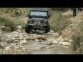 Land Rover Defender V8 on a small river
