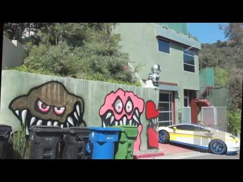 hiphollywood.com - Brown recently spray painted the side of his Hollywood Hills home with colorful, sharp tooth goblins and monsters, which neighbors are calling the