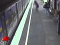 Stroller With Baby Falls Underneath Moving Train