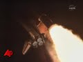 The space shuttle Discovery and her crew of seven blast off on a flight to the international space station. This was NASA's third launch attempt. (Aug. 28)