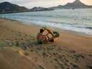 Juan Rulfo & Alexis Octavio clowning by the sea 1