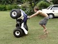 My friends trying to wheelie my lil' brother's 4 wheeler - free flv video @ vwatch.tv