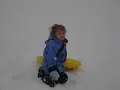 Girl on sled 1st time