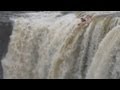 Kayakers go over 90-foot waterfall