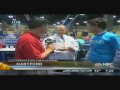 Darren Sweeney gets a flu shot on the air