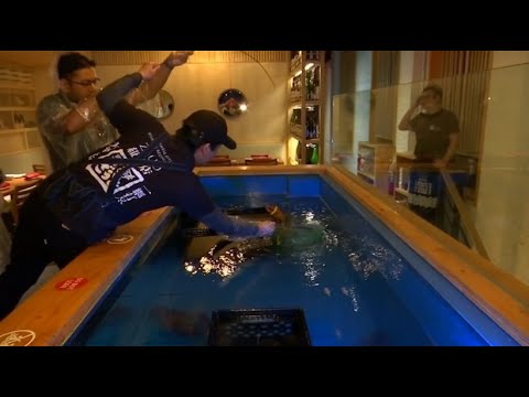 New Yorker Restaurant: Fisch fangen, in der Küche a ...