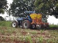TRATOR NEW HOLLAND INDO ABASTECER A ADUBADEIRA DE CANA TRATOR NEW HOLLAND INDO ABASTECER A ADUBADEIRA DE CANA