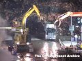 Bulldozers at ground zero putting wreckage into dump trucks