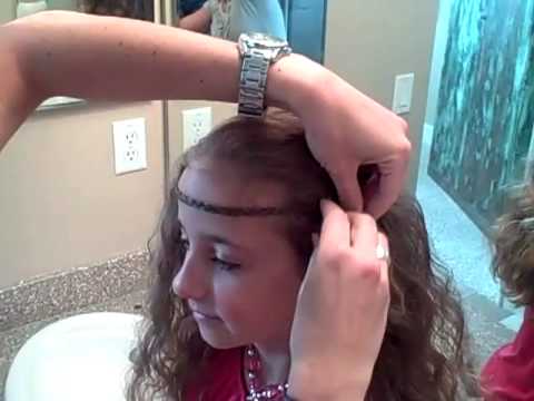 This is a fun and very simple teen hairstyle that uses a very simple braid in a very unique way. The rest of the hair was a 'second-day' hairdo after taking 