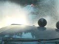 jeep cherokee driving through flooded street