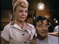 after oscar (walter matthau) is finished ordering a nice fatty dinner he says something... what the hell is he saying??