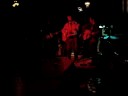 host of the parkdale revue open stage at mitzi's sister, toronto, on, jimmy byron, performs an improvised version of his original number, 