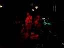 host of the parkdale revue open stage at mitzi's sister, toronto, on, jimmy byron, performs an improvised version of his original number, 