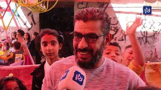 ألعاب بسيطة ومحدودة تصنع بهجة العيد لأطفال مخيم إربد