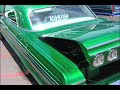 lance lambert of the vintage vehicle show talks to the owner of this car at the casuals car club show in azusa, ca.