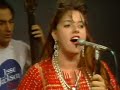 candye kane on the memorable rockabilly bandstand, santa monica, 3-15-89. jerry sikorski on guitar, then-hubby thom yearsley on bass.