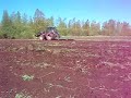 Valtra (valmet 705) with kronos 3150L harrow