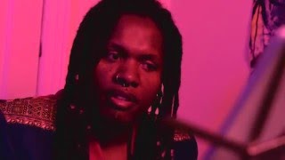 To celebrate Mother's Month, Haitian artist Monvelyno Alexis serenades his mother w/ his new son