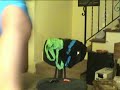 CROSSDRESSER Kelley Konnor is Wearing a Shiny Teal Bottom over a Blue Thong Leotard