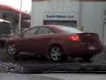 Short Clip of Red Pontiac G6 at Gas Station Short Clip of Red Pontiac G6 at Gas Station