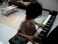 น้ำเซาะทราย Piano by 6 year old kid