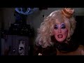 this is the midnight mass with your hostess peaches christ national television show airing on the hdnet movie channel, executive produced by mark cuban. the show captures the underground cult movie phenemonen led by ms. christ in san francisco. her stage-shows, celebrity guests, and midnight movie tributes are internationally renowned. this television show was filmed throughout the summer of 2007 during the 10th anniversary season of midnight mass. 

this is part three of episode 5 capturing peaches' very special guest of honor & ghoul-friend elvira, mistress of the dark. it also features appearances by horror host mr. lobo, midnight mass music director & macabre snob vinsantos, peaches' personal assistant and full-time costume designer tria connell, the jazz talents of damon and the heathens, midnight mass choreographer fauxnique and back-up dancers lemay, salon, and bea dazzler. also, flawed sidekick extraordinaire martiny.

this tv episode airs before an un-interrupted high-definition televised screening of peter jackson's dead alive. 

the midnight mass with your hostess peaches christ television show is produced by cheryl cooper, jeff siebert, and hillary depuy.

hdnet movie channel (all rights reserved)
copyright 2007