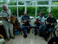 clive and other members of group 'rickety bridge' sing and play popular sea shanty.
liverpool judies or row bullies row.