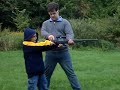7 year old shooting a 12ga. bolt action slug gun!!