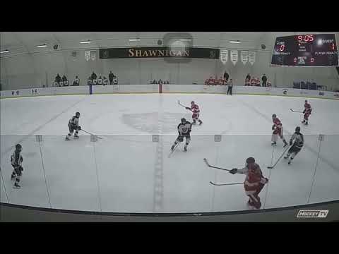 Liam Downie #6 using a nice body check to separate the player from the puck, causing his team to gain puck possession