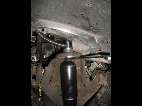 How to replace the front shocks on a 2004 Mazda B3000