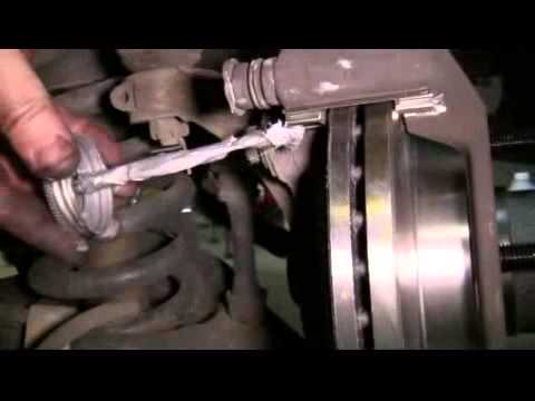 How to Replace the Front Brake Pads and Rotors on a 2003 Ford F150