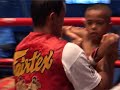 www.photoshow.org - for photos of another Muay Thai event in Pattaya. This video is round 2-5. I filmed this at a Muay Thai competition in Pattaya, Thailand. Summer of 2005. Young fighters take the stage and go into the ring. This video is split into 2 segments, first segment (Previous video, see: www.youtube.com ) starts with the Ram Muay (Muay Thai boxing dance) following the round 1. Next segment (This video) shows rest of the fight, round 2-5. More Muay Thai videos are on the way! Please subscribe! And do rate and comment! If you happen to know the names of the competitors, feel free to sent me a message! See photos from an another other Muay Thai event here: www.photoshow.org