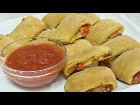 pizza pockets - More recipes at http://www.bhavnaskitchen.com http://www.indianrecipevideo.com http://www.veggierecipevideos.com.