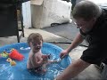 Uncle Ryan playing with Shawn in the pool. Pool time is Shawn's favorite activity.