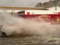Ambulance High Speed Through Flash Flood