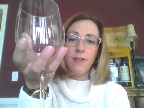 how to properly hold a wine glass
