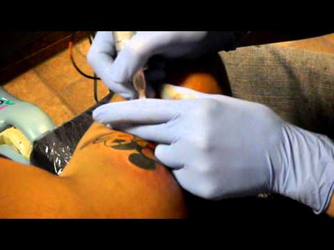 getting my tattoo colored!